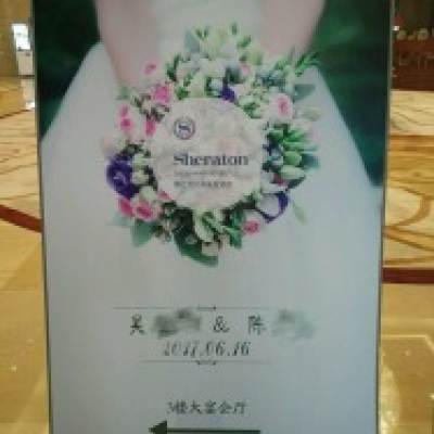镇江市钻石缘婚礼会馆logo